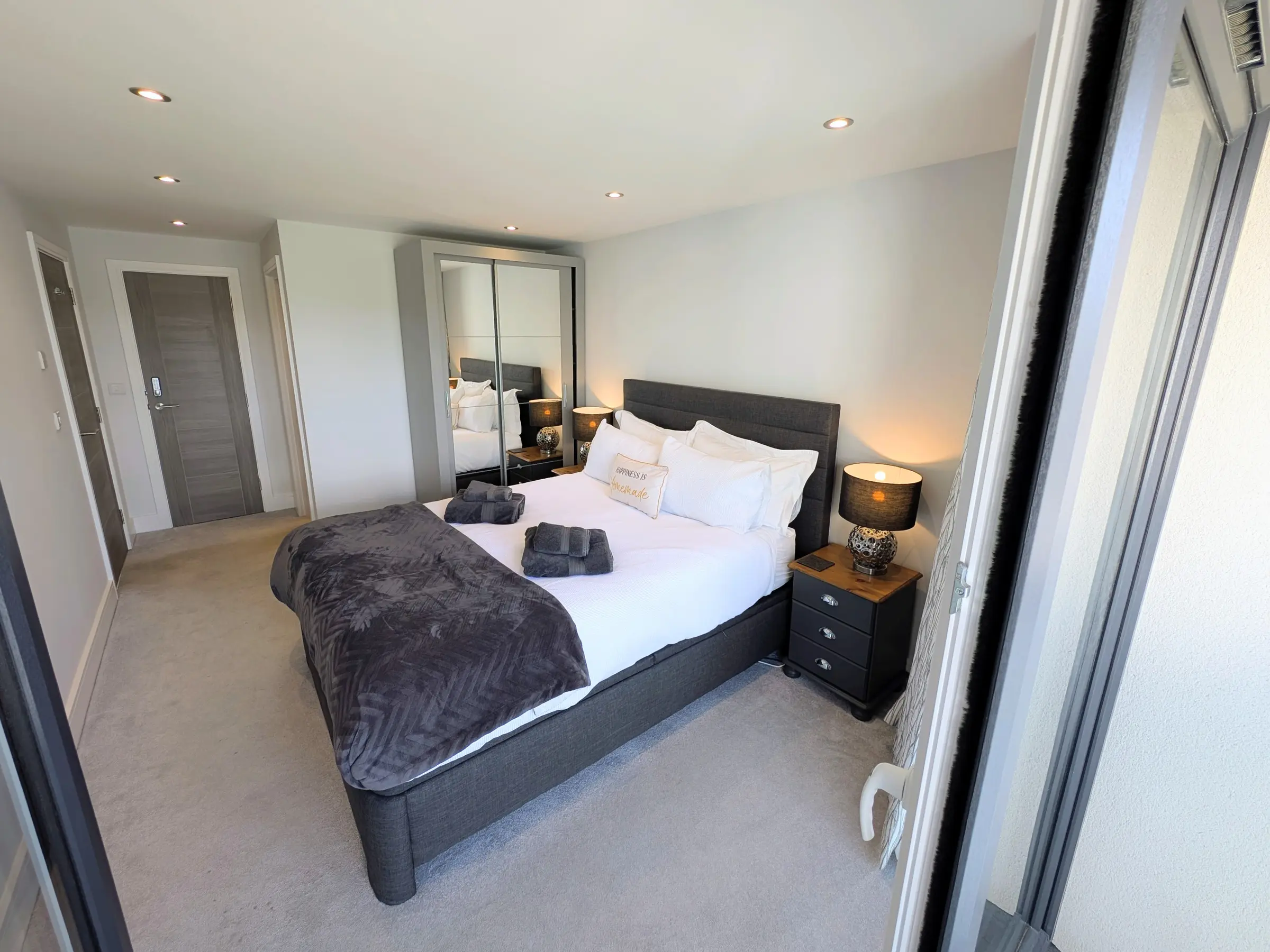 Master bedroom viewed from its private balcony doorway
